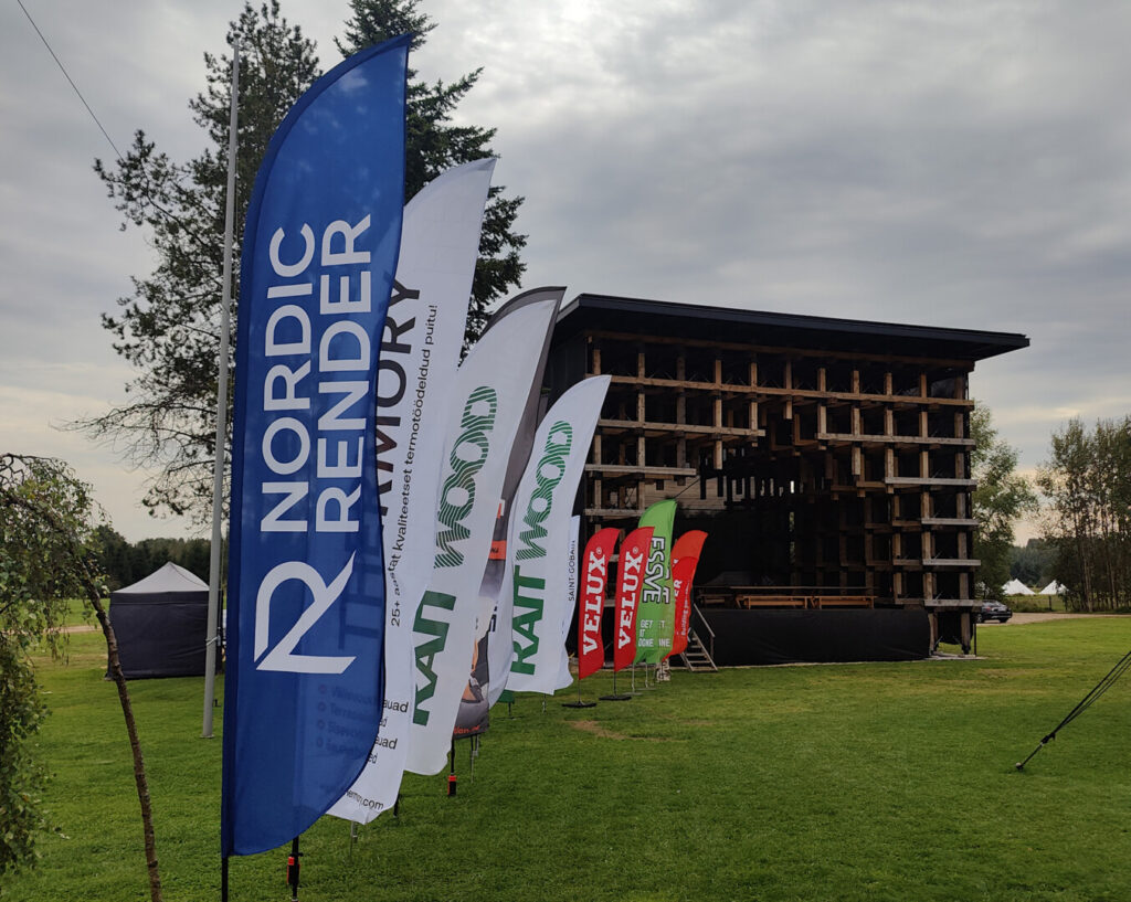 Nordic Render Flagge auf der Woodhouse Sommerkonferenz 2025, die die Teilnahme des Unternehmens am Wettbewerb Prefab Haus des Jahres hervorhebt.